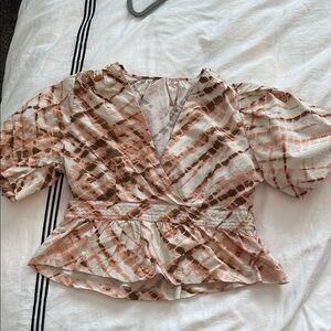 Marie Oliver tie dye blouse doesn’t have tag but fits a small